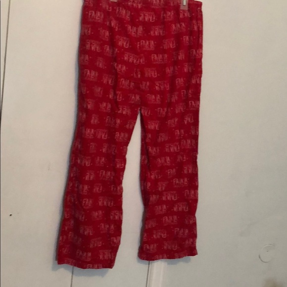 A pair of red Tommy Hilfiger pajama pants - Picture 2 of 2